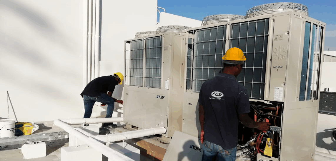 AC repair UAE technician inspecting AC unit