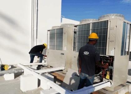 AC repair UAE technician inspecting AC unit